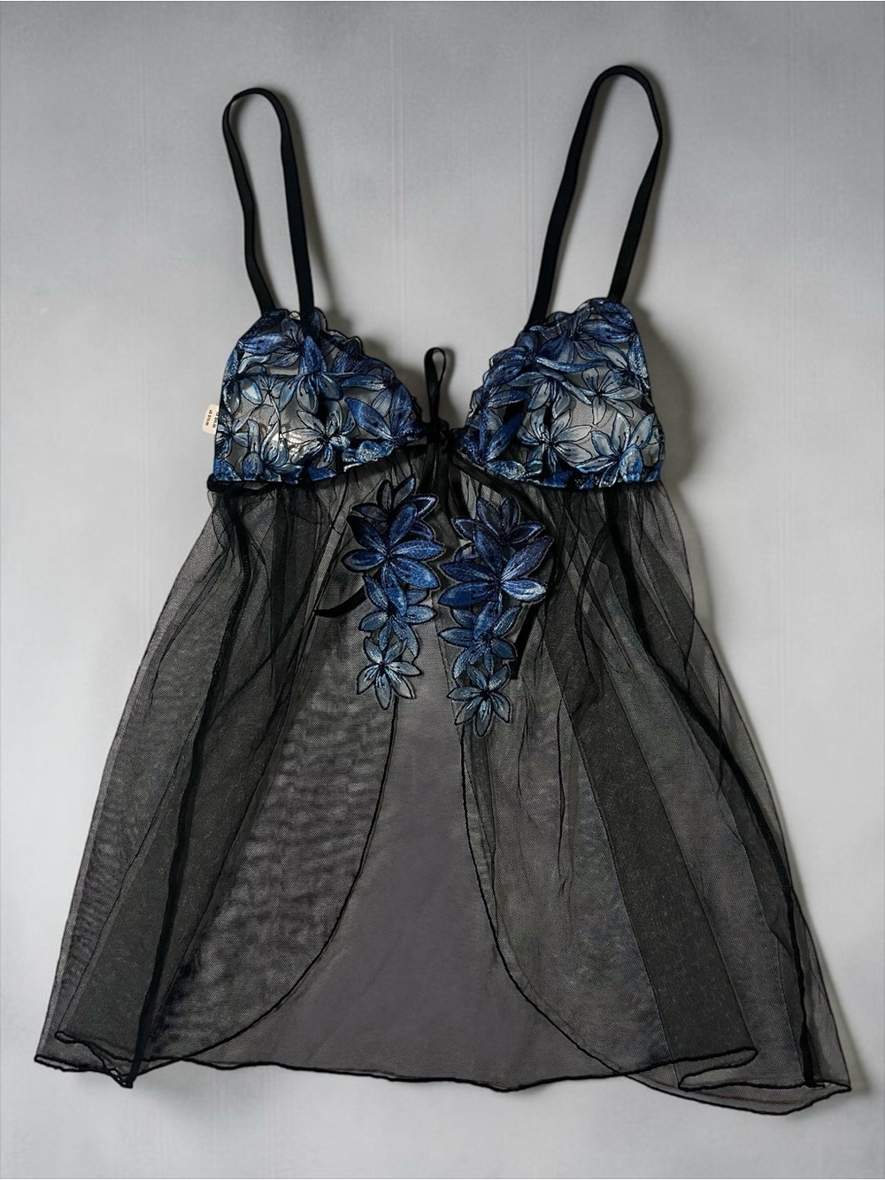 NWT Victoria’s Secret sheer flower detailed black slip. Size S
